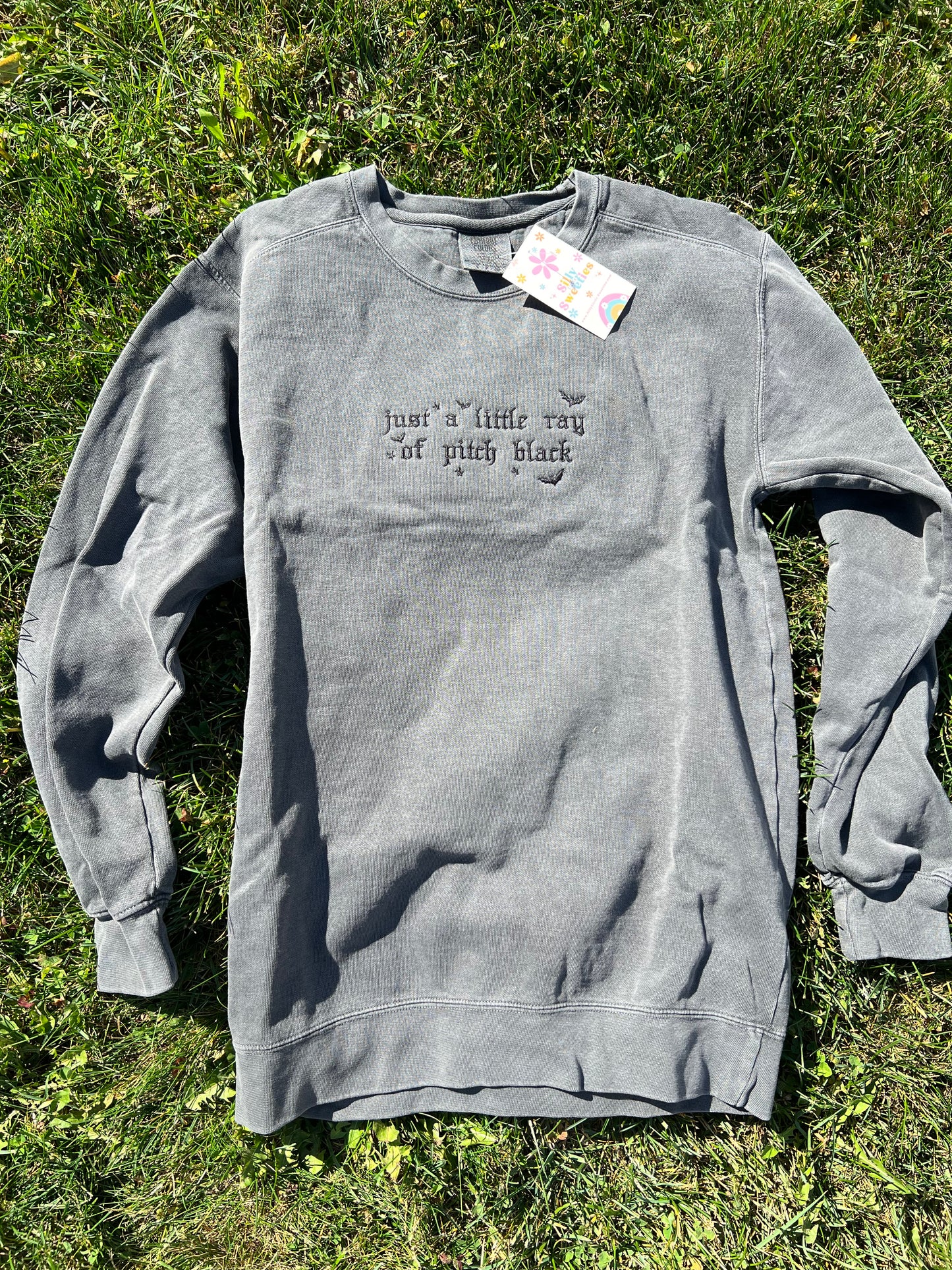 Just a Little Ray of Pitch Black Sweater Embroidered