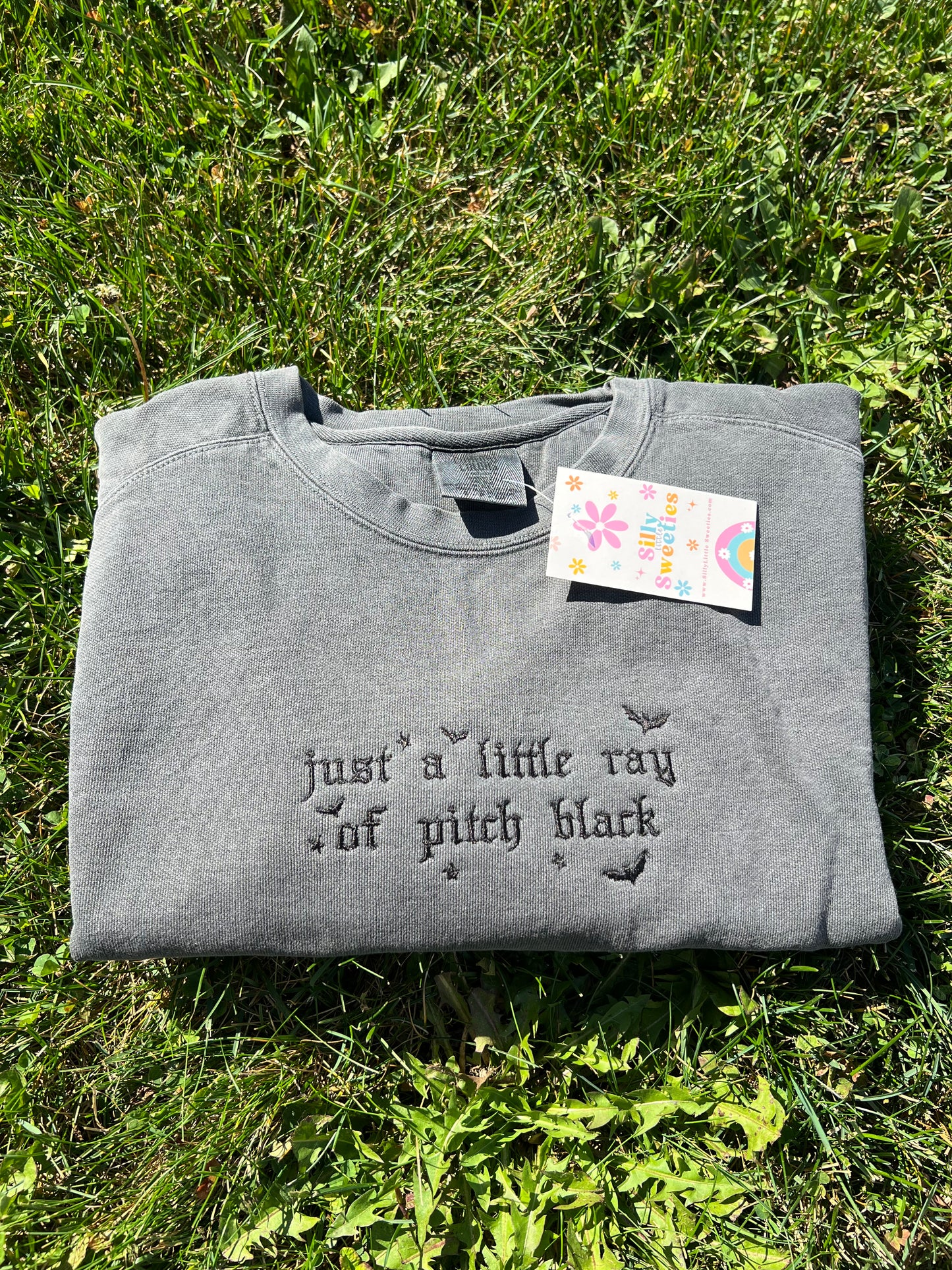Just a Little Ray of Pitch Black Sweater Embroidered
